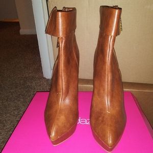 Brown and gold platform boots